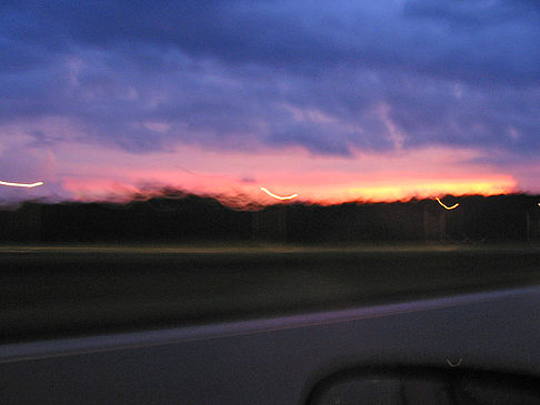 Sonnenuntergang auf Highway Foto 